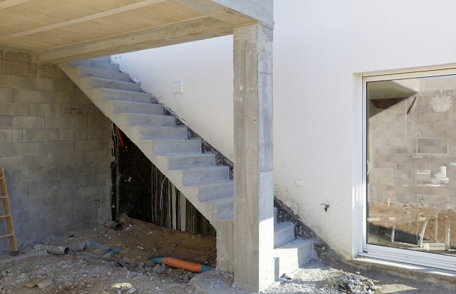 Masonry works: excavation, block walls and access staircase