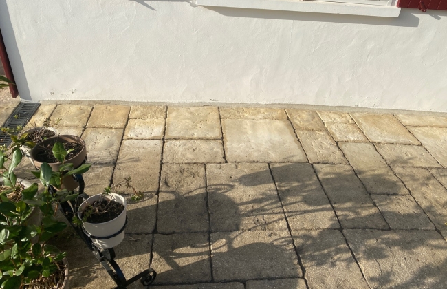 Renovation of exterior stone terrace with tile installation in Hendaye