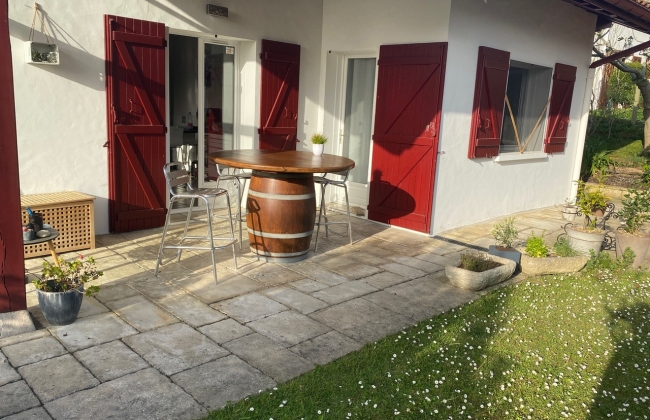 Renovation of exterior stone terrace with tile installation in Hendaye