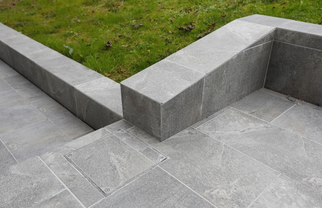 Renovation of exterior stone terrace with tile installation in Hendaye